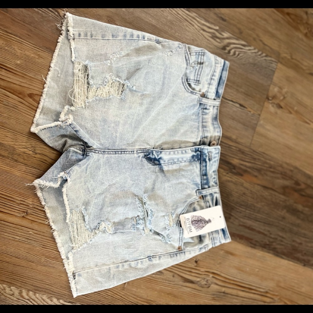 High waisted distressed light jean shorts